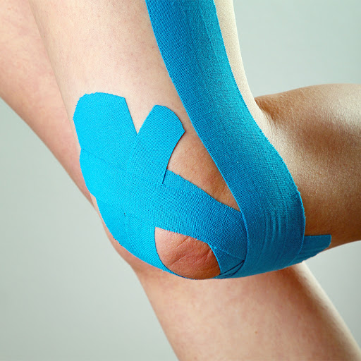brentwood-physiotherapy-knee-wrapped-in-blue-knee-tape